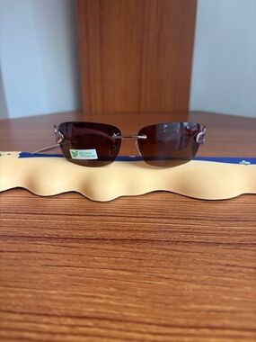 Selena Gomez Rimless Sunglasses with Brown Lenses